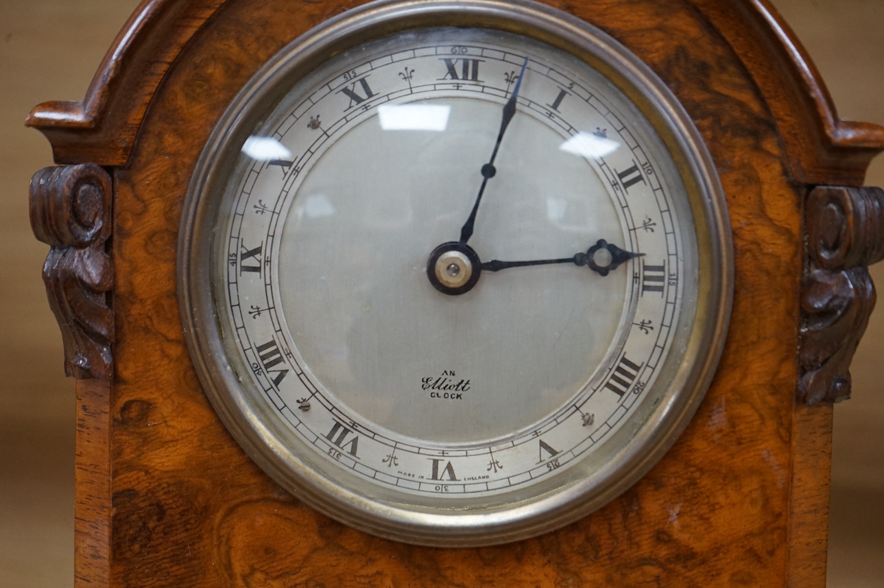 An Elliot burr walnut mantel timepiece, 18cm high. Condition - good.